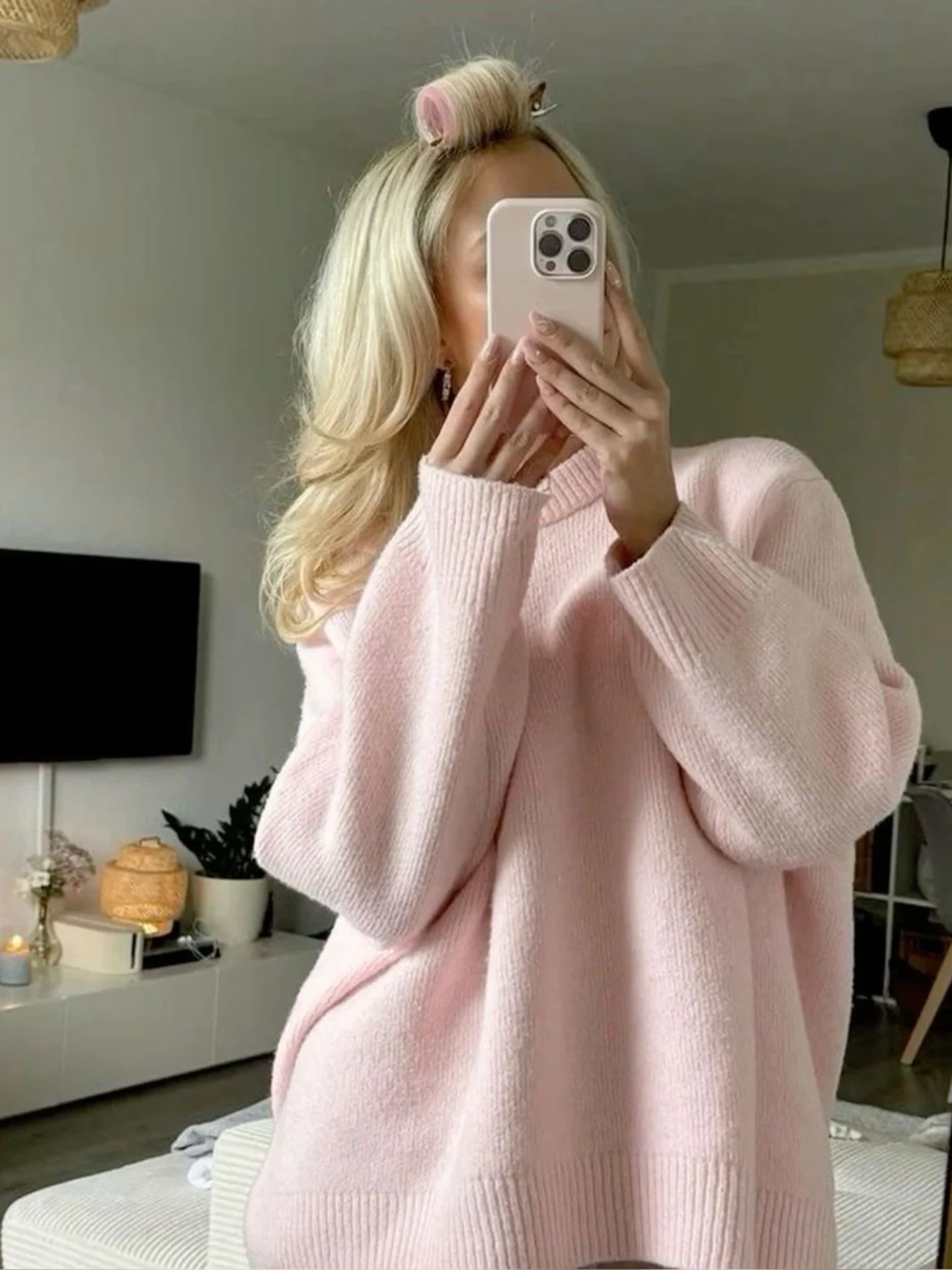 Übergroßer rosa Pullover