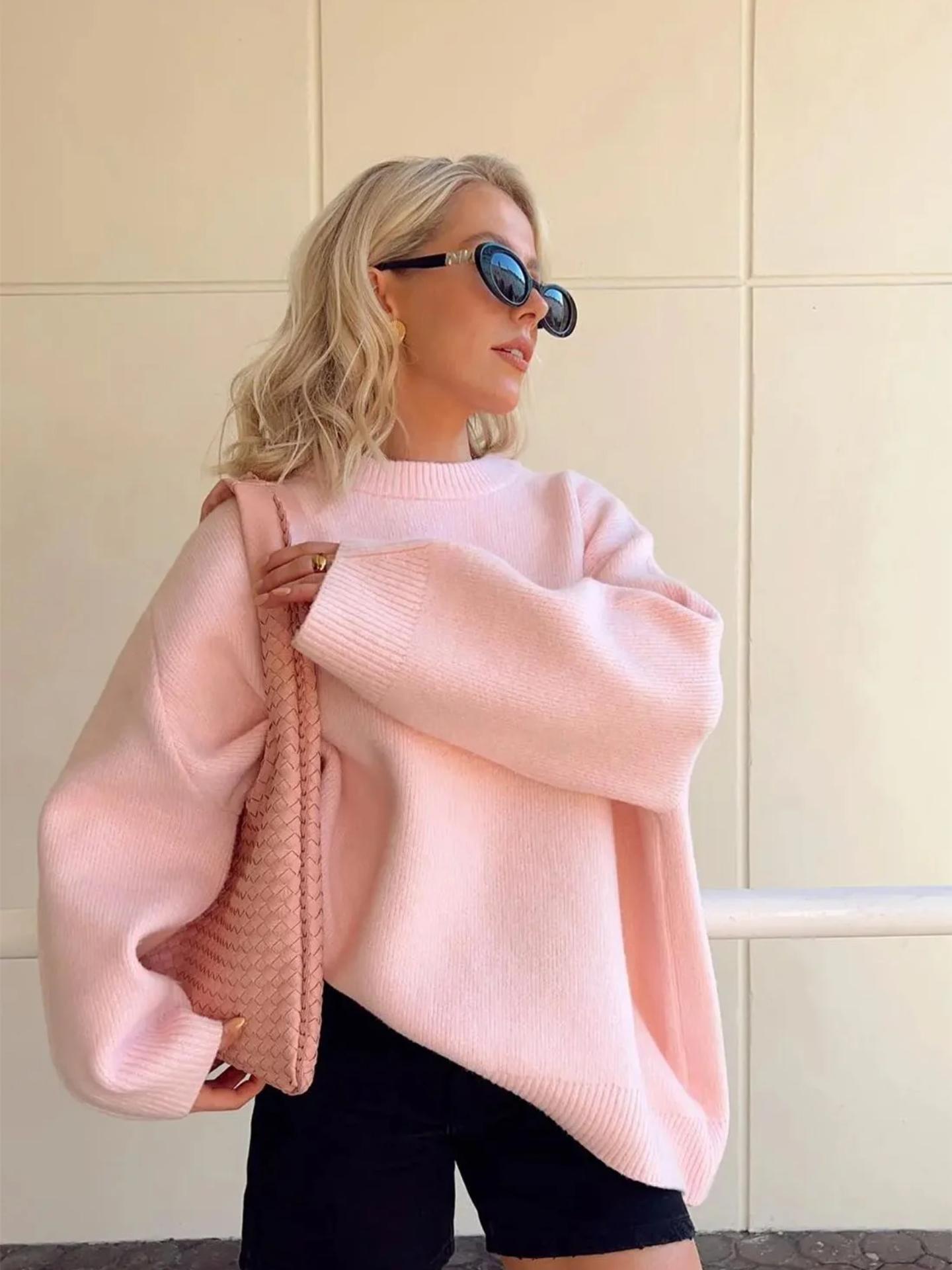 Übergroßer rosa Pullover