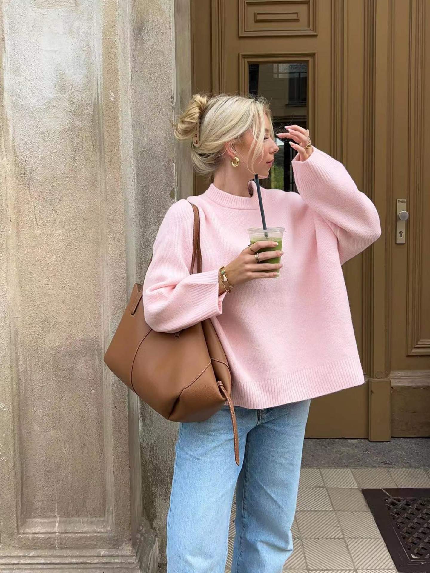 Übergroßer rosa Pullover